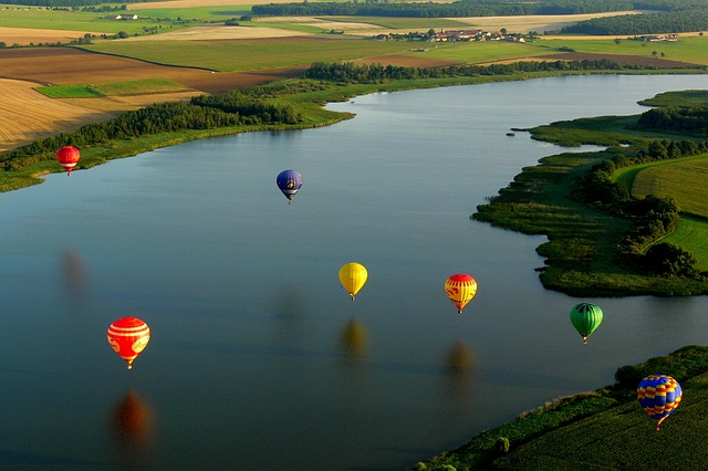 Hot Air Balloons Over Water