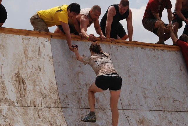 Woman Climbing Obstacle